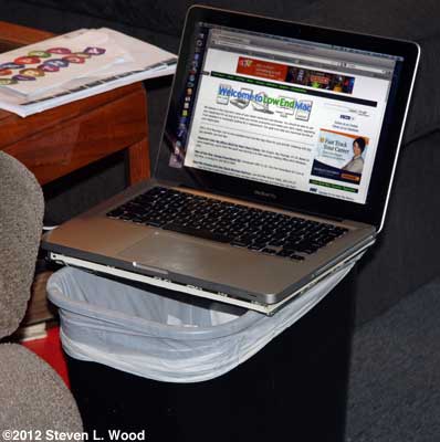 MacBook on trashcan